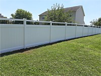 <b>6 foot high white vinyl privacy fence with black aluminum spindle toppers</b>